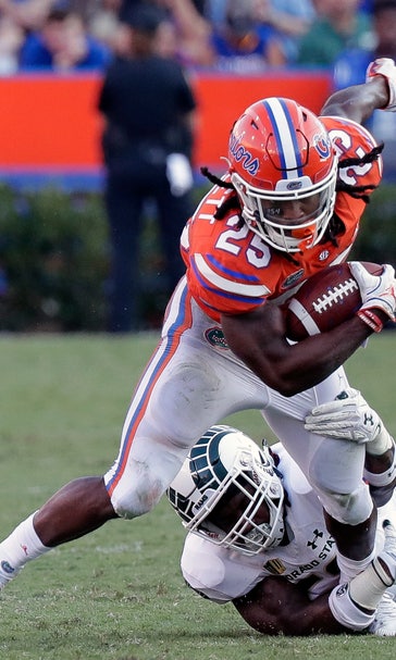 Swain scores twice, Florida handles Colorado State 48-10